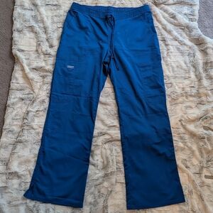 Revolution by Cherokee Workwear Women's Drawstring Flare Scrub Pant Petite Royal